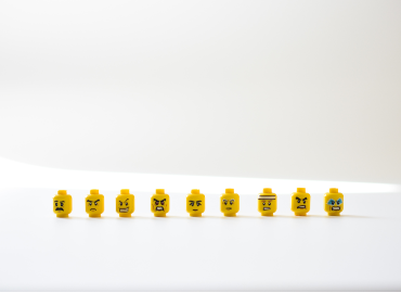 Lego heads with different facial expressions