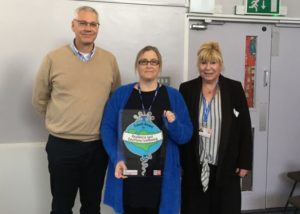 Staff from St Anthony's School are presented with the Kent Award by Cabinet Member Lesley Game.