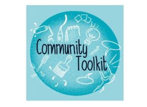 Blue circle with white drawings such as a hammer, pen, paintbrush and black writing 'community toolkit'