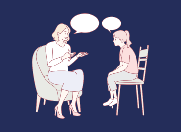 adult and teen sat on chairs talking